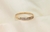 Anillo Cintillo Oro 18k 1,5gr medio sinfin con Cubics blancos