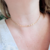 Chocker com mini medalhinhas em banho de Ouro 18K - comprar online