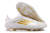 Chuteira Adidas F50 FG na cor Branco com detalhes em Dourado nas laterais e no solado