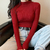 Suéter feminino de manga comprida e gola alta