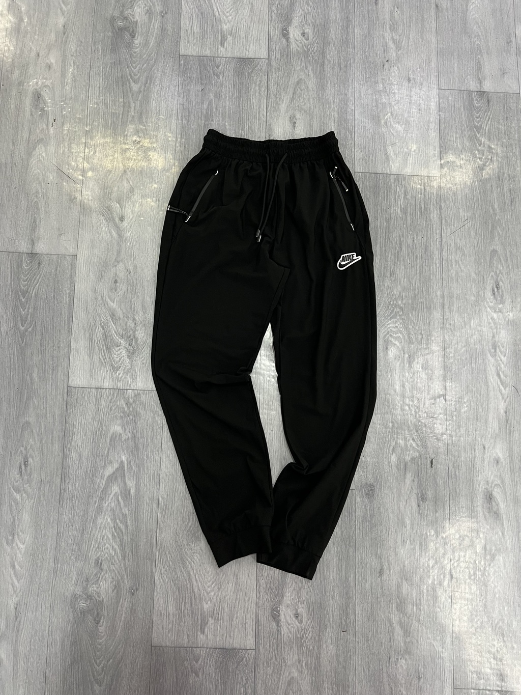 Pantalon nike con cierre hotsell