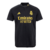 camisa-preta-real-madrid-adidas-com-detalhe-e-simbolos-em-dourado-com-botao-camisa-23-24-uniforme-três-third