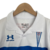 Kit Infantil Universidad Católica I Under Armour 23/24 - Branco com detalhes em azul e vermelho na internet