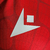 Camisa Crystal Palace I 23/24 - Jogador Macron Masculina - Vermelha e azul com detalhes em branco - ARTIGOS ESPORTIVOS | BR SOCCER