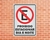 Placa Proibido Estacionar Dia e Noite (Cod: ES04) - comprar online