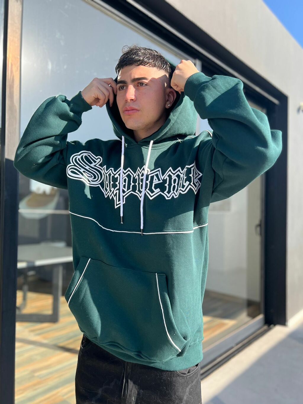 Buzo supreme precio deals
