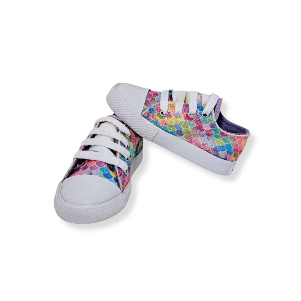 Zapatillas blancas con brillo multicolor para niña