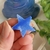 This captivating Sodalite crystal star radiates with insightful energy, symbolizing clarity of mind and purpose. Embrace its soothing vibrations to enhance your communication skills and intuitive abilities.