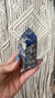 An image showcasing the Sodalite Point, a polished crystal made from natural sodalite stone. This crystal is known for enhancing mental clarity and spiritual awareness, making it an ideal tool for professionals in sales, customer service, and executive po