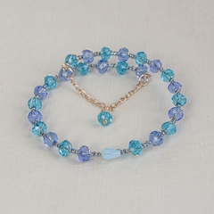 18k gold-plated bracelet, embroidered with crystals in shades of blue.