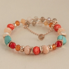 18k gold-plated bracelet, embroidered with natural stones and a mix of colored crystals.