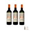 Tres botellas de vino Finca La Anita Merlot Blend de Añadas, con etiquetas ilustrativas y tapones naranjas.