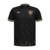 Vista frontal da Camisa Botafogo II 2024 Reebok Masculina, design preto com grafismo de chamas em jaquard e detalhes em bronze.