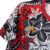 Camisa-pré-jogo-flamengo-collab-farm-Rio-2024-2025-flores-rio-de-janeiro-vermelha-com-flores-pretas-masculina-rio-de-janeiro-futebol-carioca-urubu