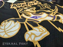 CAMISETA TORONTO RAPTORS N°15 NEGRA CON DORADO