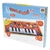 Caixa do Tapete Musical Infantil DM Toys, apresentando um piano com teclas e ícones de instrumentos musicais.