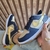 Tênis Nike Dunk Azul e Dourado