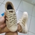 Tênis Adidas Superstar Bege com Dourado - comprar online