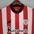 Camisa Athletic Bilbao 22/23 Vermelha e Branca - New Balance - Masculino Torcedor - Hash Imports - Artigos Esportivos