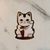 Sticker Gato Con Manga Fondo Rose Gold 4.5 x 6.5 Cm - LA BOTICA