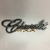 EMBLEMA CHEVROLET MANUSCRITO DO OPALA 1975 ATÉ 1979 - UN - comprar online