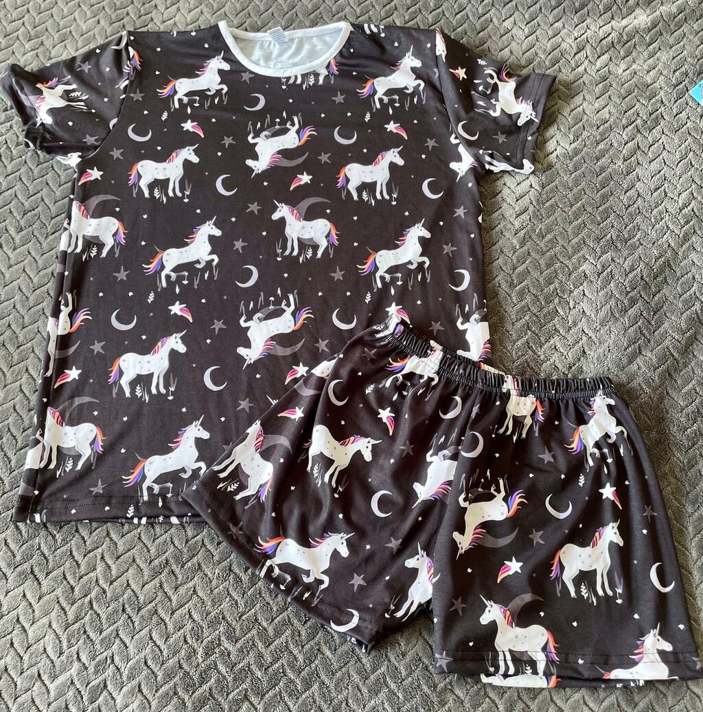 Pijama unicornio negro shop