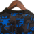 nova-camisa-sevilla-torcedor-castore-III-3-23-2023-24-2024-preto-preta-detalhes-azul-gola-v-