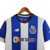 camisa-porto-new-balance-23-2023-24-2024-branco-azul-branca-gola-v-