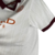 Camisa Manchester City II 23/24 - Torcedor Puma Masculina - Branca com detalhes em laranja e vinho