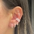 Piercing Fake Conch Zing Zang Cravejado na internet