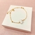 Pulseira bolinhas e borboleta - banhado a ouro 18k - comprar online