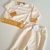 Conjunto plush blanco-miel en internet