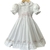 Vestido branco infantil com bordado rococo na barra