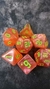 Set de 7 dados glitter acrilico naranja (GL40)