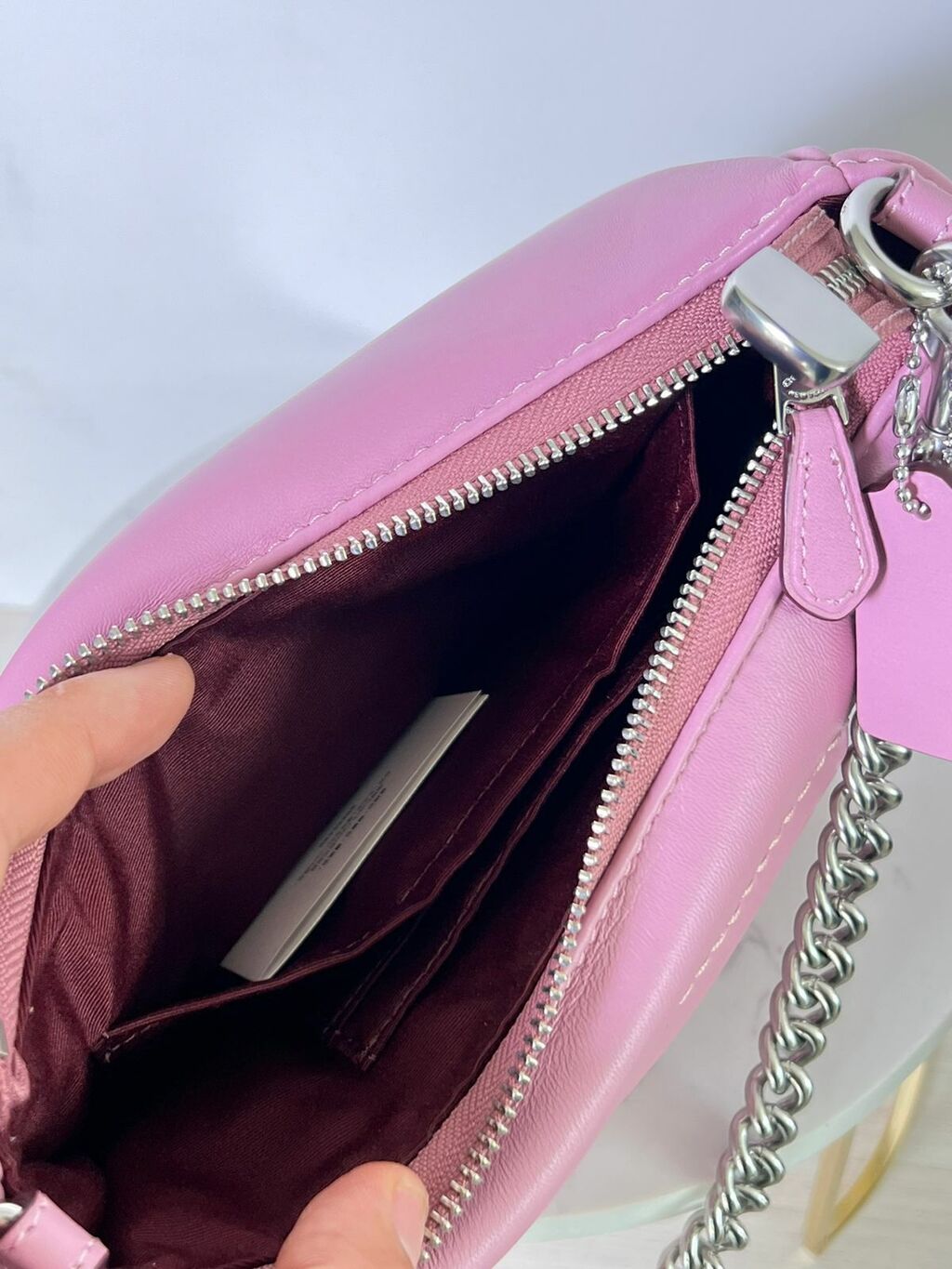 Bolsa Coach rosa con cadena Comprar en AG Tiendas