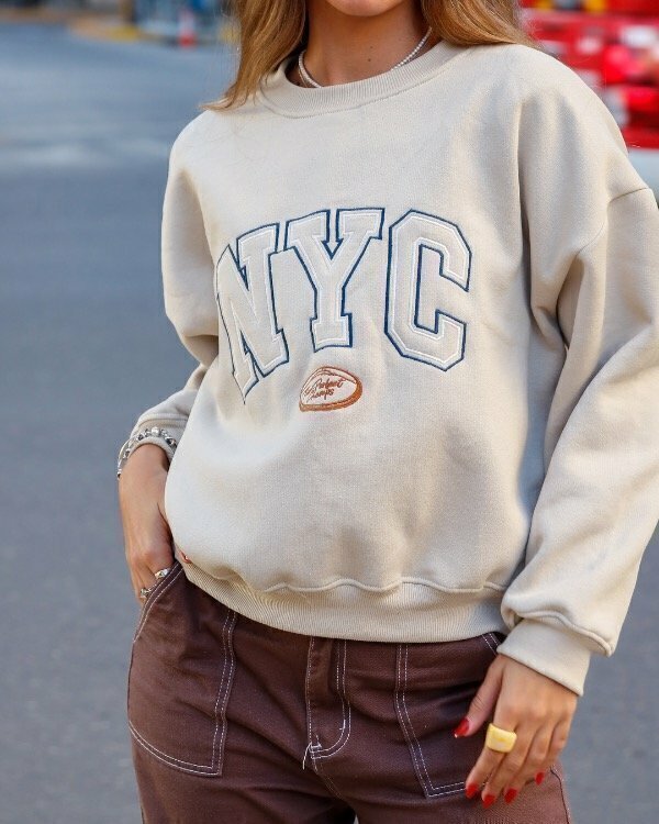 Buzo NYC beige Comprar en Al indumentaria