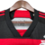 Camisa do Flamengo I 24/25, modelo torcedor masculino, nas cores preta e vermelha, com detalhes em vermelho e logo da Adidas.