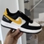 Tênis Air Force 1 '07 LV8 Athletic Preto Branco Amarelo