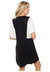 Vestido jacaranda jersey crepe rayon spandex, escote en U recortes delanteros en frente con mangas amplias. calce holgado talle 1-2-3 Color: negro