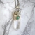 Amuleto pirita, malaquita y cuarzo cristal en internet