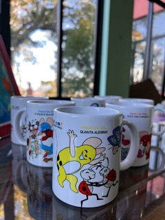 DOIS LIVROS E UMA CANECA DOS PERSONAGENS OS PINGOS VALOR 90,00 + FRETE PAC OU SEDEX - loja online