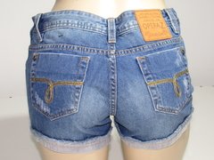 Short Feminino Jeans Lixado Barra Desfiada Coleção Verão 2023 - comprar online