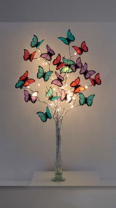 Mariposas en flor Colores A Elegir con florero de vidrio.