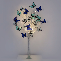 Mariposas en flor Forever Blue con florero de vidrio