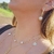 Brinco Ear Cuff Corações Vazados Espelhados Banho Ouro 18k na internet