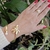 Bracelete Flor Espelhada e Pérola Banho Ouro 18K - comprar online