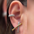 Brinco Ear Hook X Duo Colors na internet