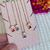 Colar Duas Meninas Coração De Zirconias Cristal Folheado A Ouro 18k - Drusi | Loja de Semijoias - Coleções de Colares Femininos, Brincos