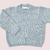 SWEATER BOLSILLO GRIS