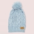 GORRO POMPON TEJIDO CELESTE